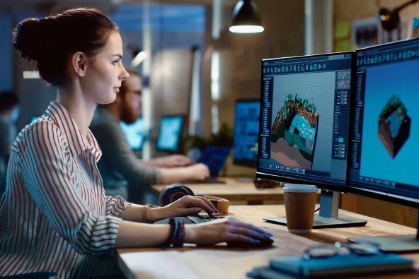 Woman sat at her desk on a computer