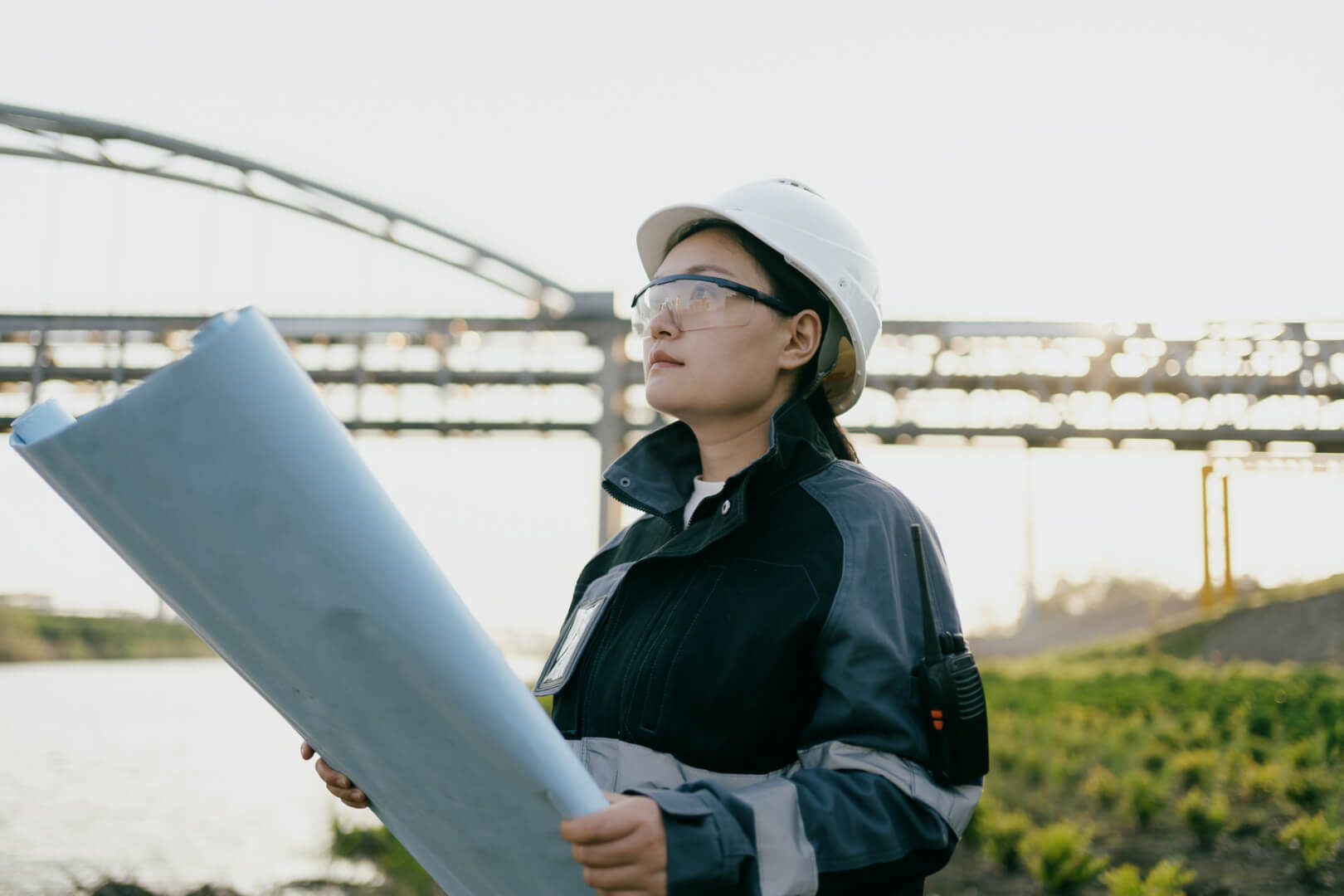 A woman outside - as a field engineer
