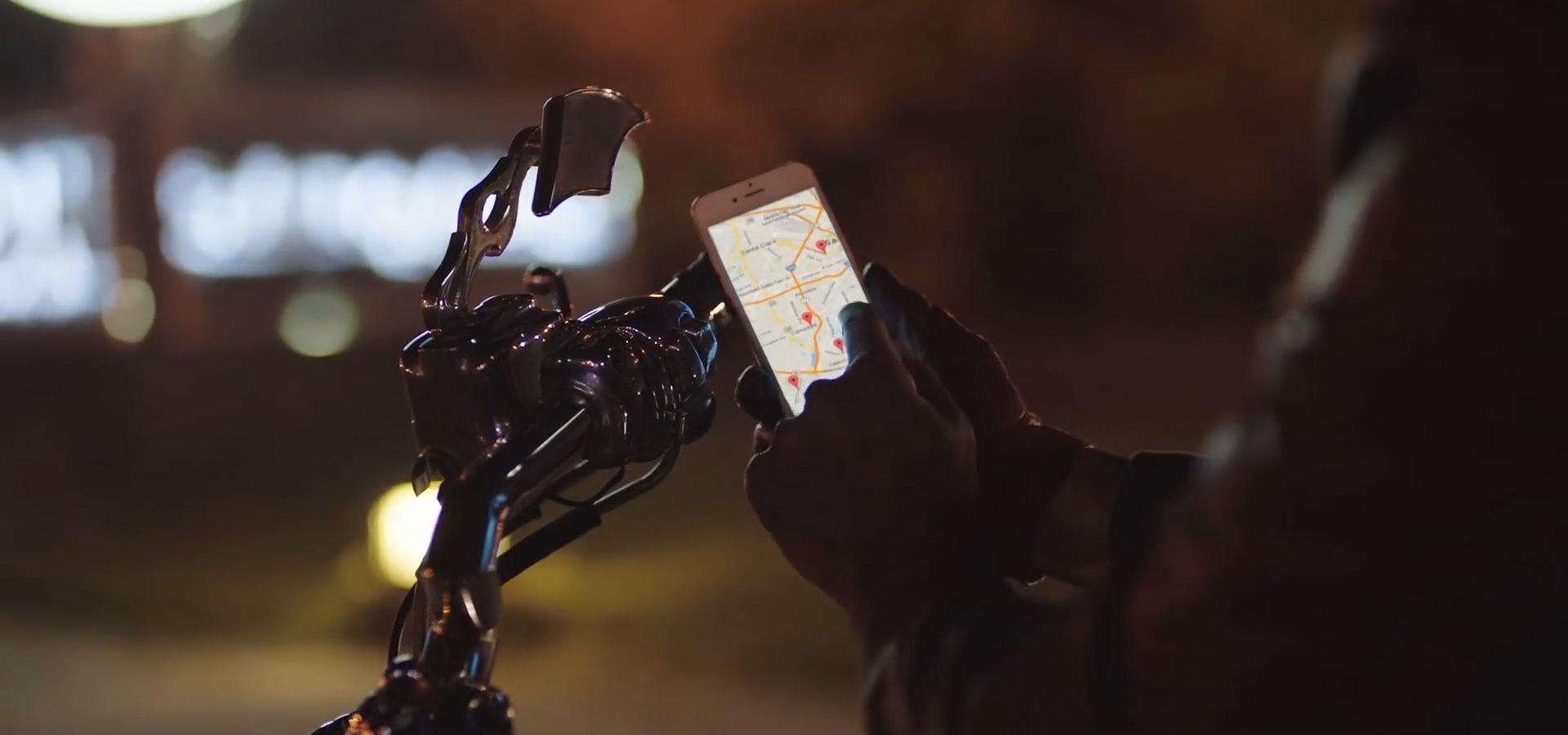 A person holding a phone with a map