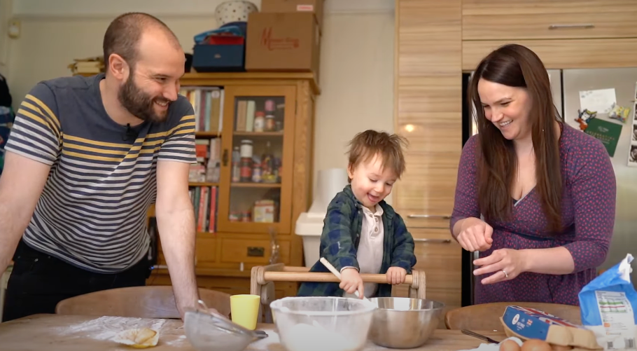 A family baking together in the kitchen