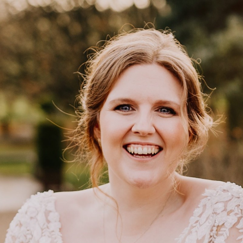 A woman smiling