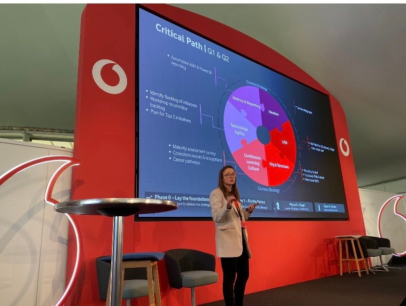 A woman presenting in an internal event on critical path